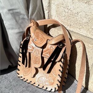 Elegant Tan Crossbody Bag with Black Accents